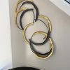 Inspire Me! Home Decor Gold And Black Loop Wall Decor